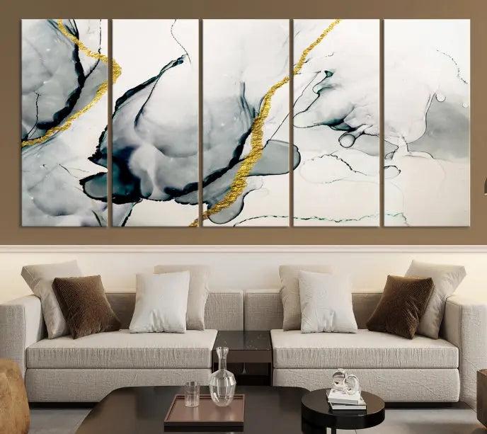 Gray Marble Fluid Effect Wall Art Abstract Canvas Wall Art Print features intricate gray and gold lines on museum-quality canvas. This ready-to-hang artwork includes a UV-protective coating to maintain its vibrant appearance.