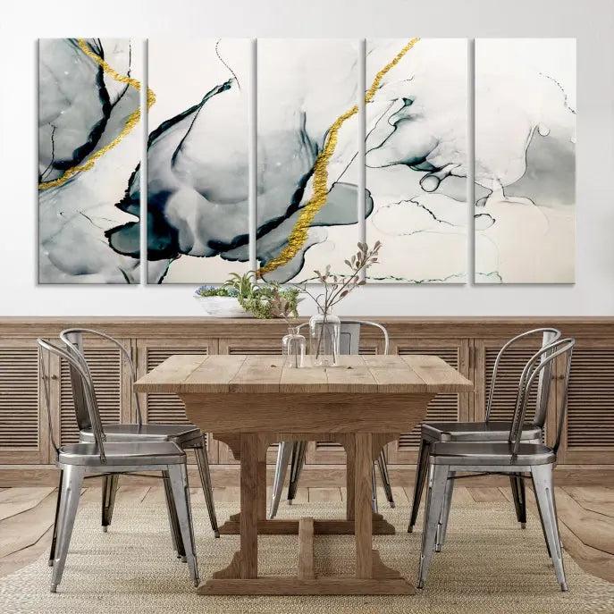 Gray Marble Fluid Effect Wall Art Abstract Canvas Wall Art Print features intricate gray and gold lines on museum-quality canvas. This ready-to-hang artwork includes a UV-protective coating to maintain its vibrant appearance.