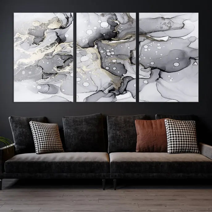 A modern living room features the Gray Marble Fluid Effect Wall Art Abstract Canvas Wall Art Print above the black wall, providing a timeless touch.