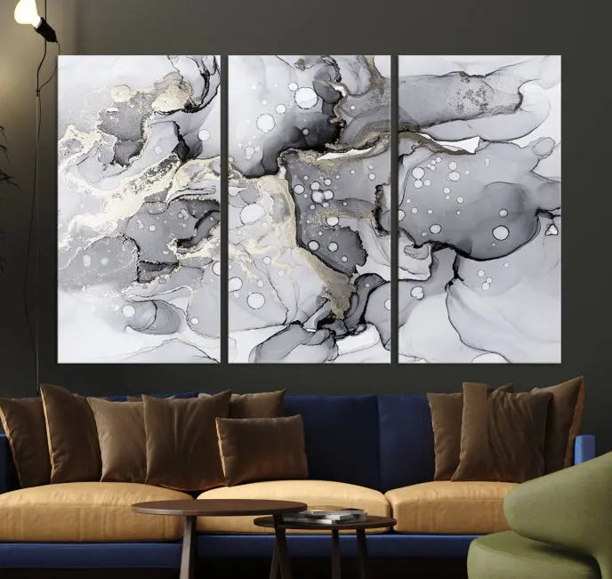 A modern living room features the Gray Marble Fluid Effect Wall Art Abstract Canvas Wall Art Print above the black wall, providing a timeless touch.