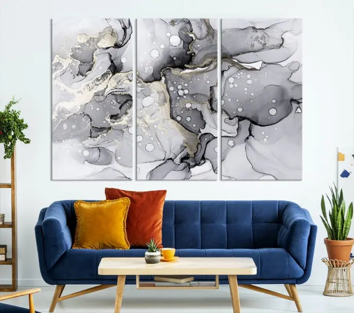 A modern living room features the Gray Marble Fluid Effect Wall Art Abstract Canvas Wall Art Print above the black wall, providing a timeless touch.