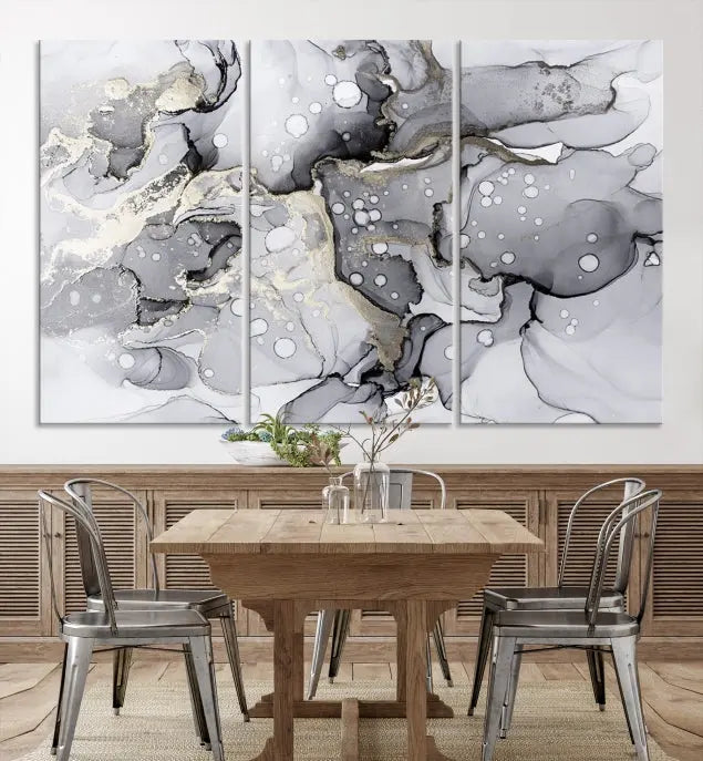 A modern living room features the Gray Marble Fluid Effect Wall Art Abstract Canvas Wall Art Print above the black wall, providing a timeless touch.