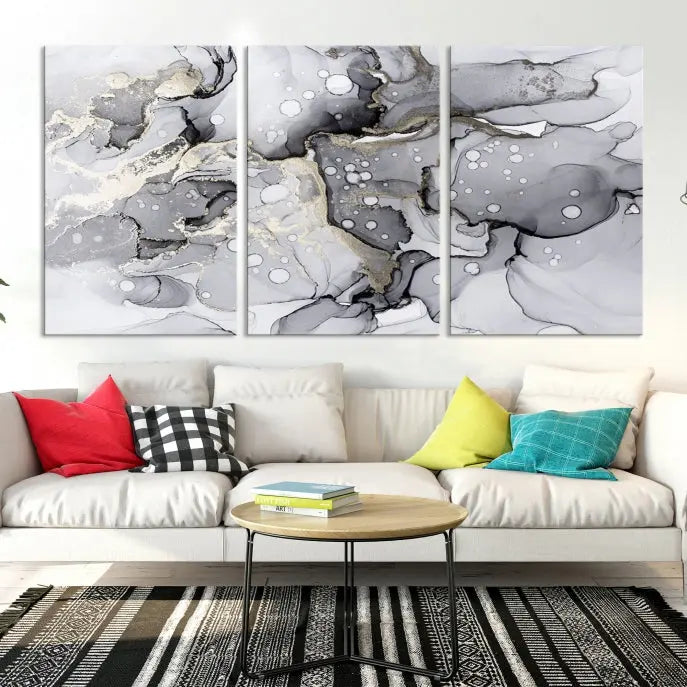 A modern living room features the Gray Marble Fluid Effect Wall Art Abstract Canvas Wall Art Print above the black wall, providing a timeless touch.