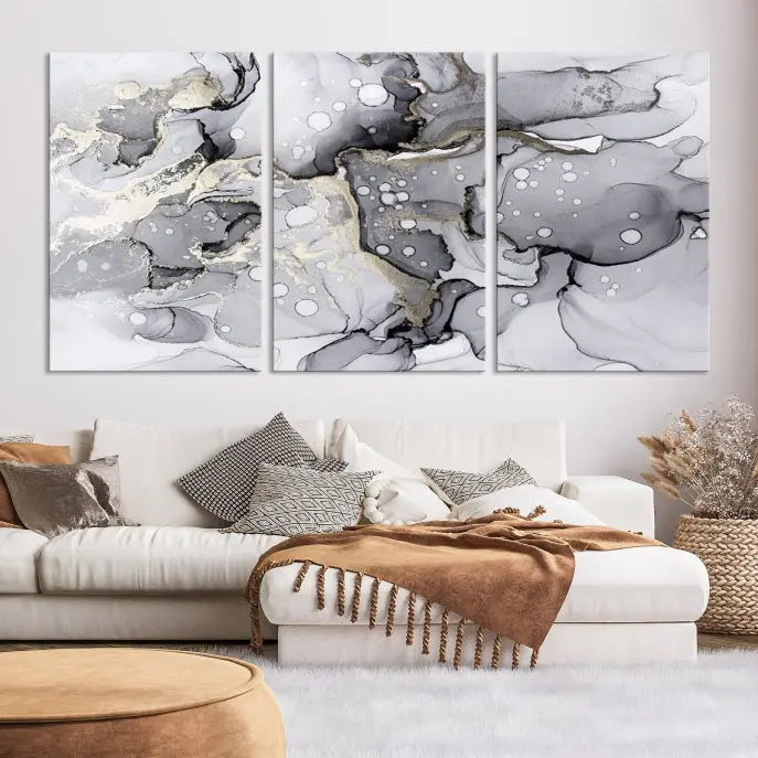 A modern living room features the Gray Marble Fluid Effect Wall Art Abstract Canvas Wall Art Print above the black wall, providing a timeless touch.