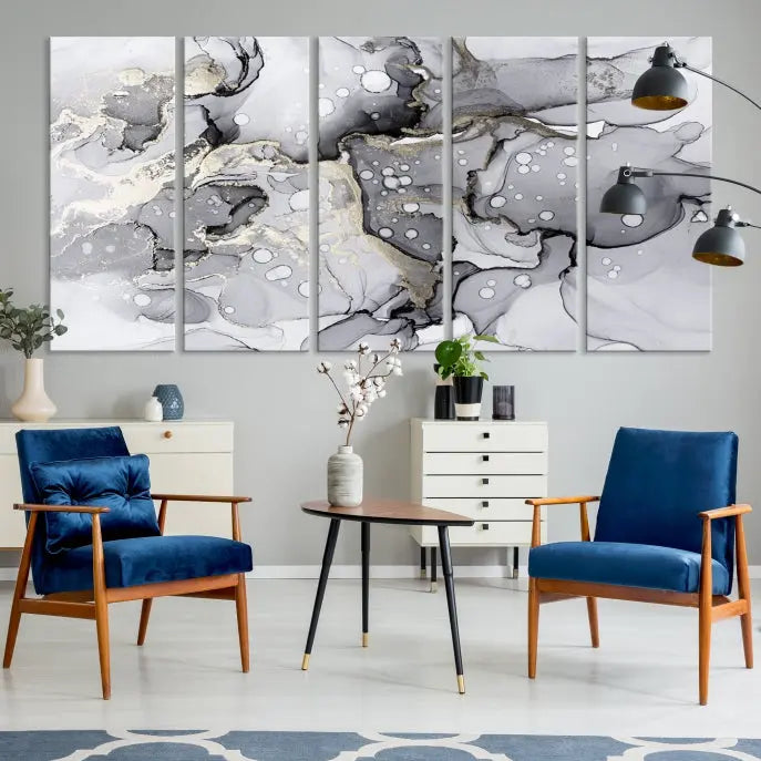 A modern living room features the Gray Marble Fluid Effect Wall Art Abstract Canvas Wall Art Print above the black wall, providing a timeless touch.