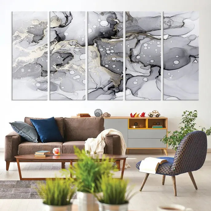 A modern living room features the Gray Marble Fluid Effect Wall Art Abstract Canvas Wall Art Print above the black wall, providing a timeless touch.