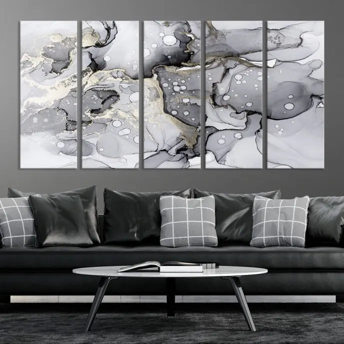 A modern living room features the Gray Marble Fluid Effect Wall Art Abstract Canvas Wall Art Print above the black wall, providing a timeless touch.