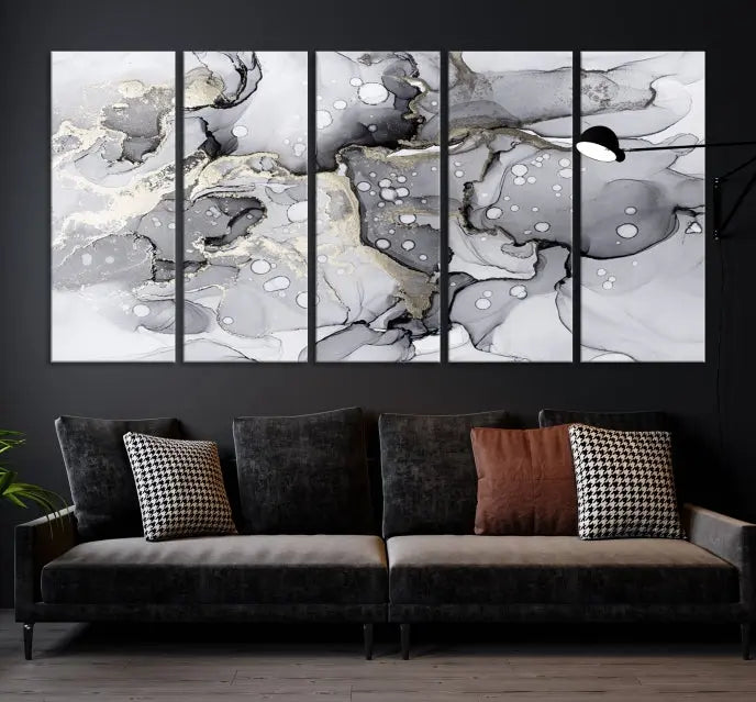 A modern living room features the Gray Marble Fluid Effect Wall Art Abstract Canvas Wall Art Print above the black wall, providing a timeless touch.