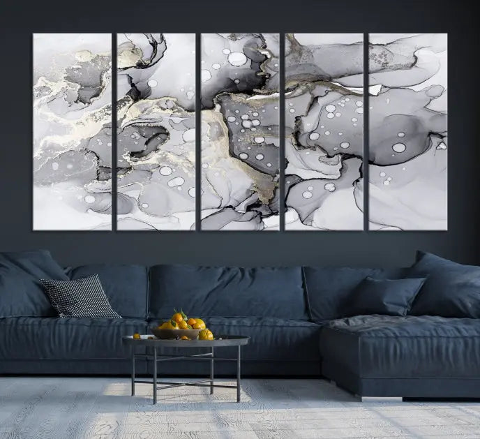 A modern living room features the Gray Marble Fluid Effect Wall Art Abstract Canvas Wall Art Print above the black wall, providing a timeless touch.