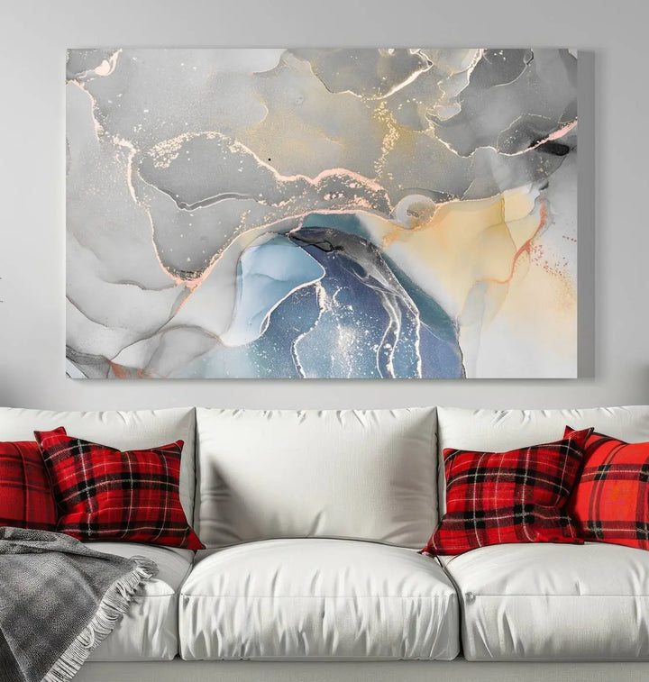 The Gray Marble Fluid Effect Wall Art Abstract Canvas Wall Art Print features elegant gold, blue, and gray hues. Crafted on museum-quality canvas, it includes a UV-protective coating for enduring vibrance. Enjoy the added benefit of free shipping.