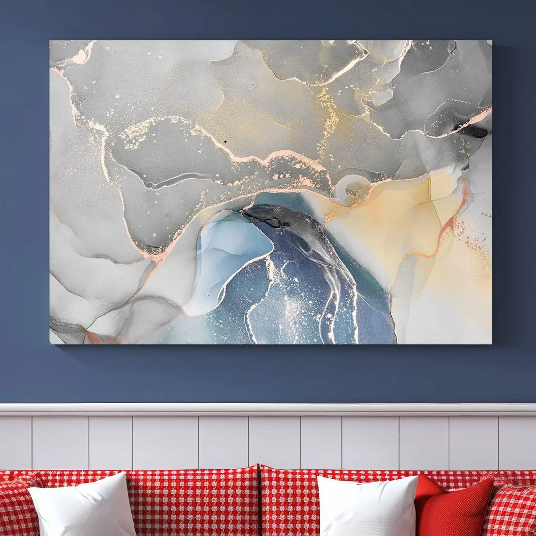 The Gray Marble Fluid Effect Wall Art Abstract Canvas Wall Art Print features elegant gold, blue, and gray hues. Crafted on museum-quality canvas, it includes a UV-protective coating for enduring vibrance. Enjoy the added benefit of free shipping.