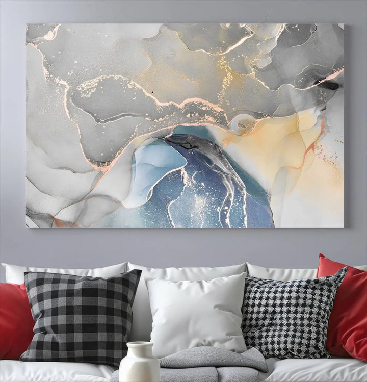 The Gray Marble Fluid Effect Wall Art Abstract Canvas Wall Art Print features elegant gold, blue, and gray hues. Crafted on museum-quality canvas, it includes a UV-protective coating for enduring vibrance. Enjoy the added benefit of free shipping.