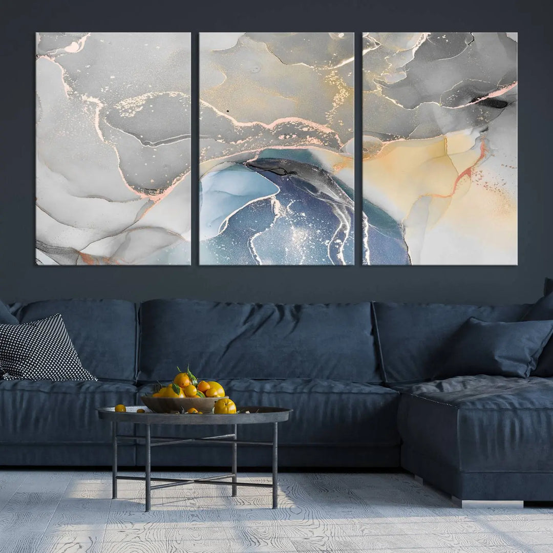 The Gray Marble Fluid Effect Wall Art Abstract Canvas Wall Art Print features elegant gold, blue, and gray hues. Crafted on museum-quality canvas, it includes a UV-protective coating for enduring vibrance. Enjoy the added benefit of free shipping.