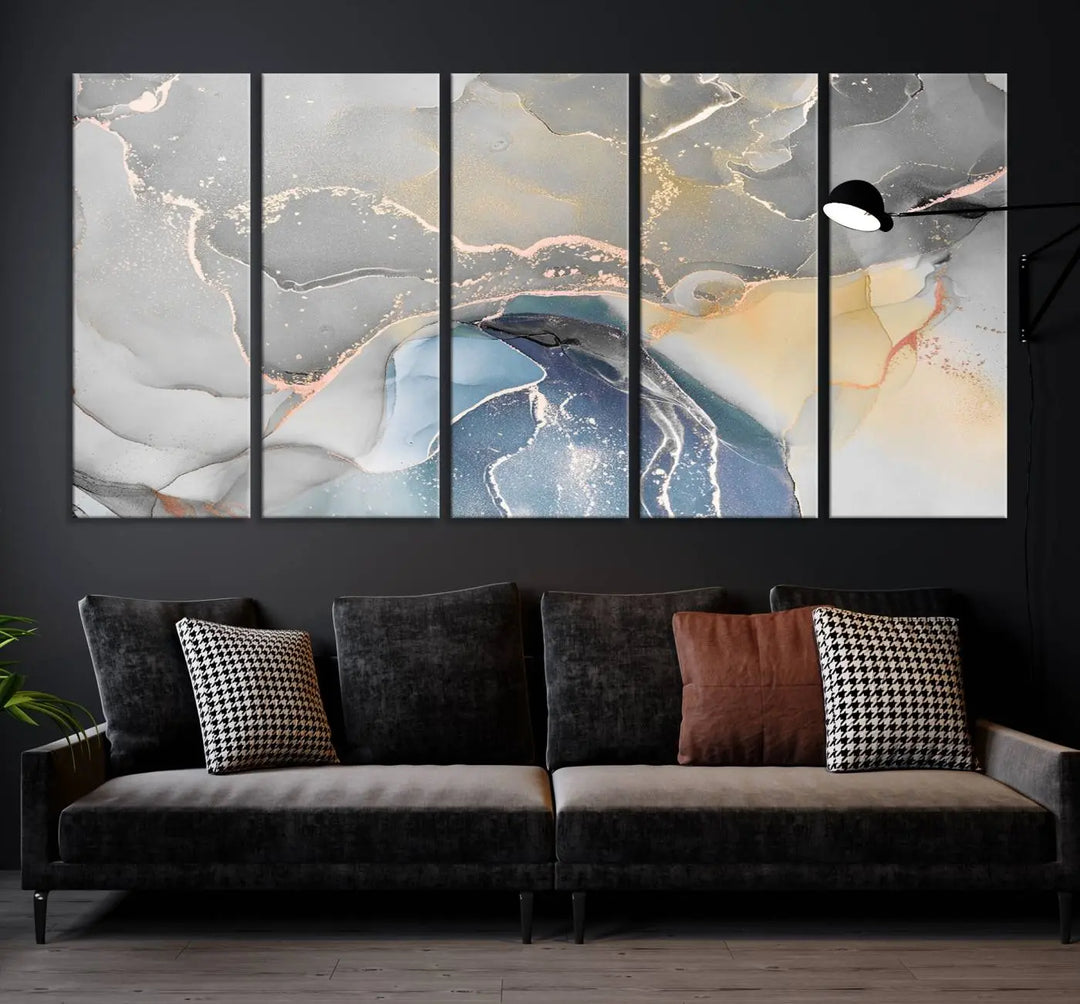 The Gray Marble Fluid Effect Wall Art Abstract Canvas Wall Art Print features elegant gold, blue, and gray hues. Crafted on museum-quality canvas, it includes a UV-protective coating for enduring vibrance. Enjoy the added benefit of free shipping.