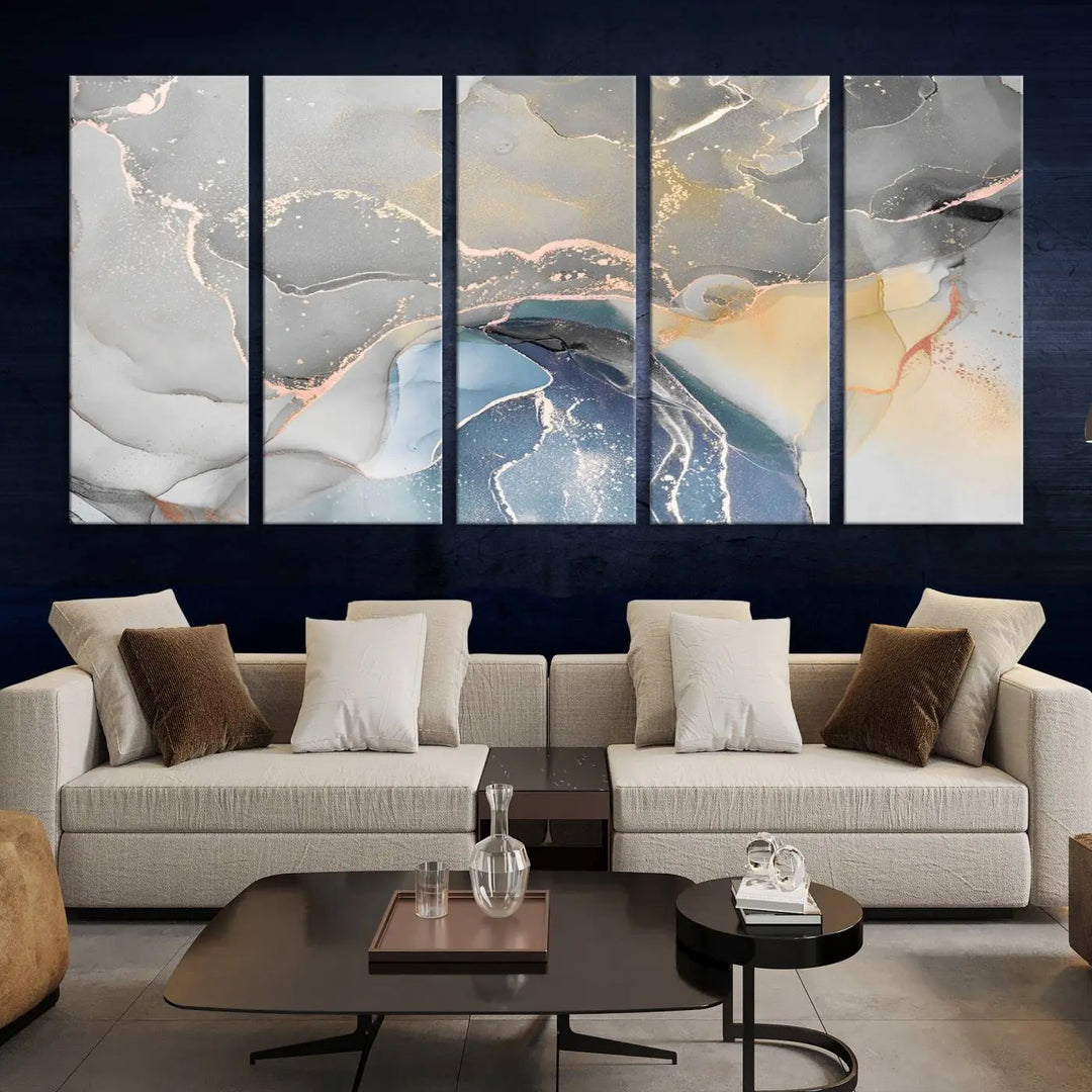 The Gray Marble Fluid Effect Wall Art Abstract Canvas Wall Art Print features elegant gold, blue, and gray hues. Crafted on museum-quality canvas, it includes a UV-protective coating for enduring vibrance. Enjoy the added benefit of free shipping.