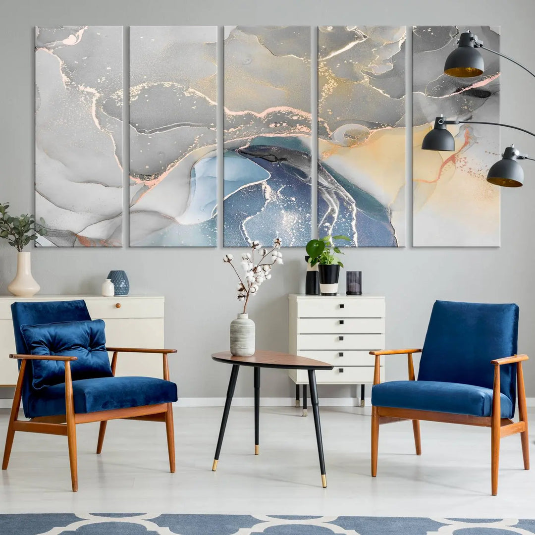 The Gray Marble Fluid Effect Wall Art Abstract Canvas Wall Art Print features elegant gold, blue, and gray hues. Crafted on museum-quality canvas, it includes a UV-protective coating for enduring vibrance. Enjoy the added benefit of free shipping.