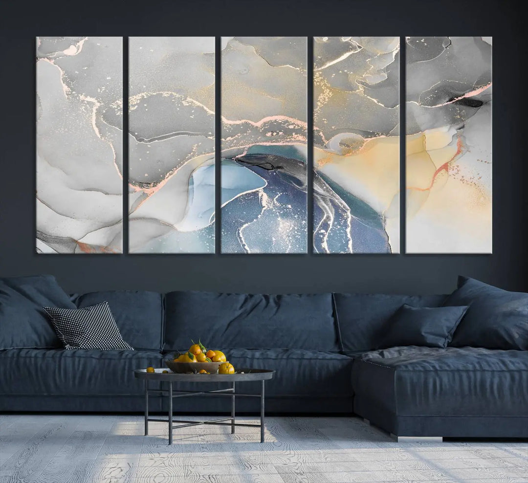 The Gray Marble Fluid Effect Wall Art Abstract Canvas Wall Art Print features elegant gold, blue, and gray hues. Crafted on museum-quality canvas, it includes a UV-protective coating for enduring vibrance. Enjoy the added benefit of free shipping.