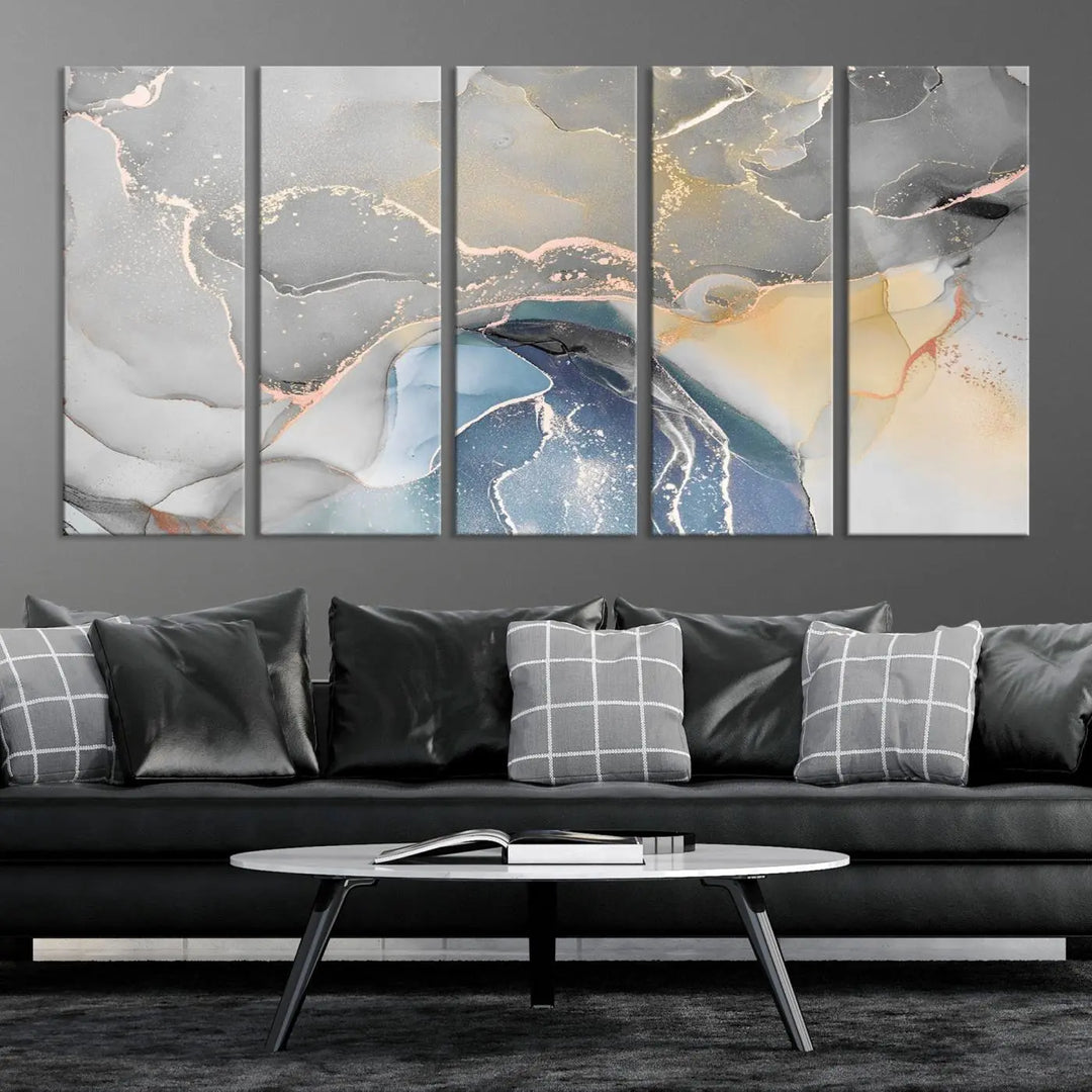 The Gray Marble Fluid Effect Wall Art Abstract Canvas Wall Art Print features elegant gold, blue, and gray hues. Crafted on museum-quality canvas, it includes a UV-protective coating for enduring vibrance. Enjoy the added benefit of free shipping.