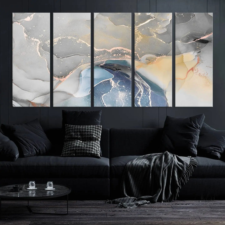 The Gray Marble Fluid Effect Wall Art Abstract Canvas Wall Art Print features elegant gold, blue, and gray hues. Crafted on museum-quality canvas, it includes a UV-protective coating for enduring vibrance. Enjoy the added benefit of free shipping.