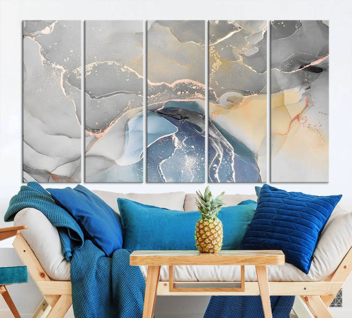 The Gray Marble Fluid Effect Wall Art Abstract Canvas Wall Art Print features elegant gold, blue, and gray hues. Crafted on museum-quality canvas, it includes a UV-protective coating for enduring vibrance. Enjoy the added benefit of free shipping.