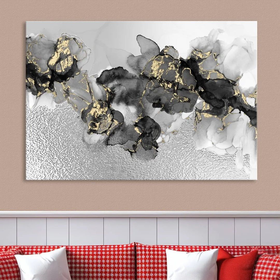 The Gray Marble Fluid Effect Wall Art Abstract Canvas Print, featuring black, white, and gold textured patterns, is crafted on museum-quality canvases and finished with a UV-protective coating. This piece adds sophistication to any space.