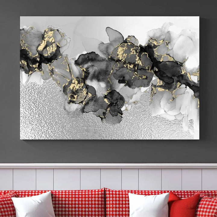 The Gray Marble Fluid Effect Wall Art Abstract Canvas Print, featuring black, white, and gold textured patterns, is crafted on museum-quality canvases and finished with a UV-protective coating. This piece adds sophistication to any space.