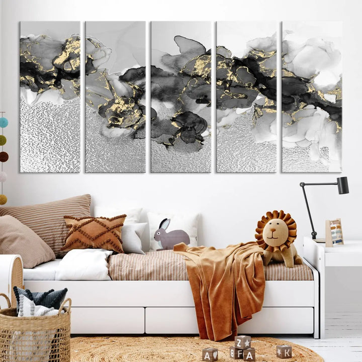 The Gray Marble Fluid Effect Wall Art Abstract Canvas Print, featuring black, white, and gold textured patterns, is crafted on museum-quality canvases and finished with a UV-protective coating. This piece adds sophistication to any space.