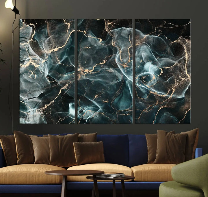 The Gray and Gold Marble Smoke Effect Wall Art Abstract Canvas graces the wall, offering a museum-quality piece with a UV-protective coating. This artwork is available with free shipping, ready to transform your space into an instant masterpiece.