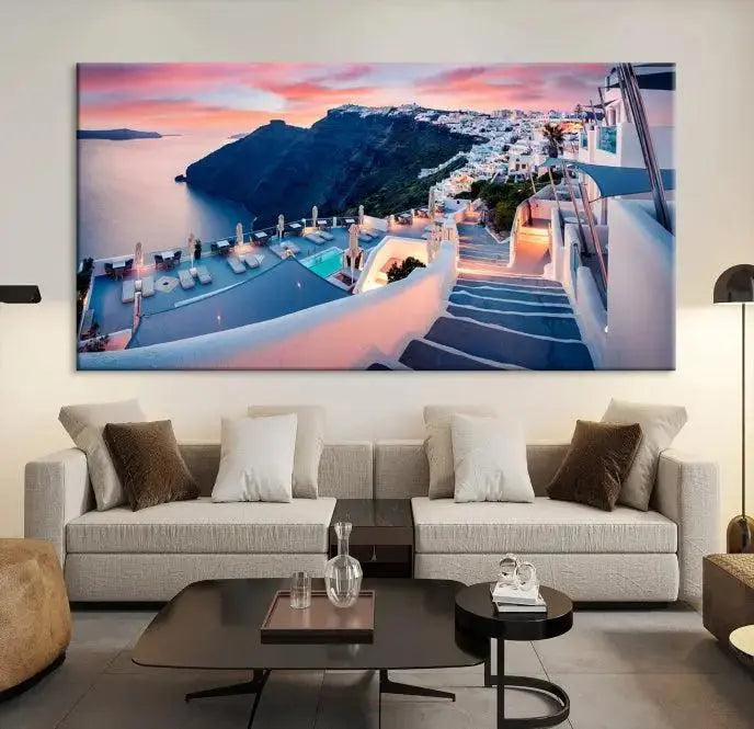 Greece Santorini Wall Art Landscape Canvas Print showcases a coastal village at sunset, featuring white buildings and an ocean view. The gallery-wrapped image is printed on museum-quality canvas for lasting beauty.