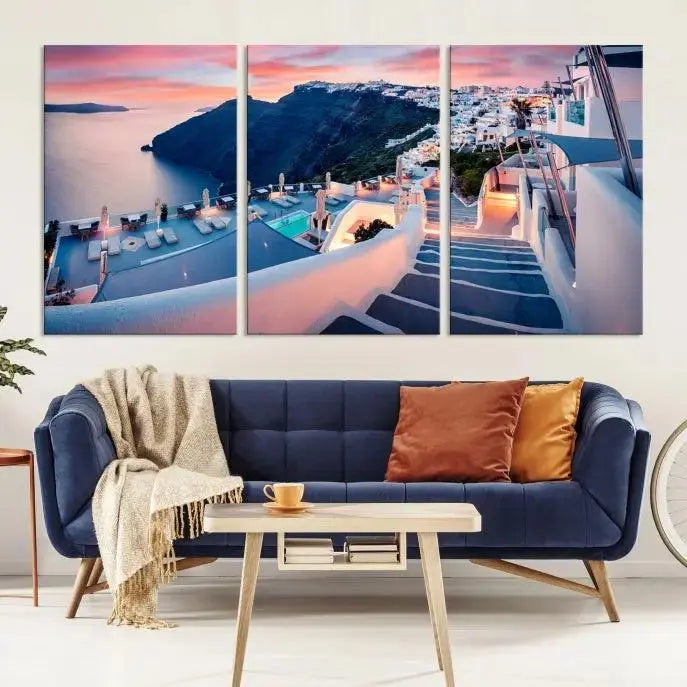 Greece Santorini Wall Art Landscape Canvas Print showcases a coastal village at sunset, featuring white buildings and an ocean view. The gallery-wrapped image is printed on museum-quality canvas for lasting beauty.