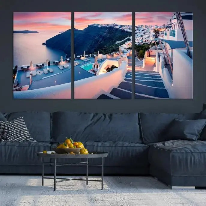 Greece Santorini Wall Art Landscape Canvas Print showcases a coastal village at sunset, featuring white buildings and an ocean view. The gallery-wrapped image is printed on museum-quality canvas for lasting beauty.