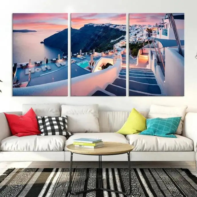 Greece Santorini Wall Art Landscape Canvas Print showcases a coastal village at sunset, featuring white buildings and an ocean view. The gallery-wrapped image is printed on museum-quality canvas for lasting beauty.