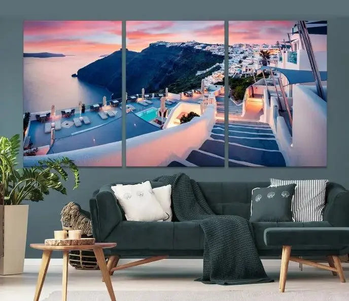 Greece Santorini Wall Art Landscape Canvas Print showcases a coastal village at sunset, featuring white buildings and an ocean view. The gallery-wrapped image is printed on museum-quality canvas for lasting beauty.