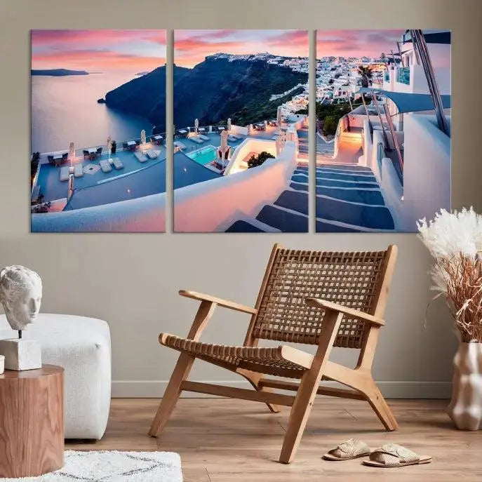 Greece Santorini Wall Art Landscape Canvas Print showcases a coastal village at sunset, featuring white buildings and an ocean view. The gallery-wrapped image is printed on museum-quality canvas for lasting beauty.