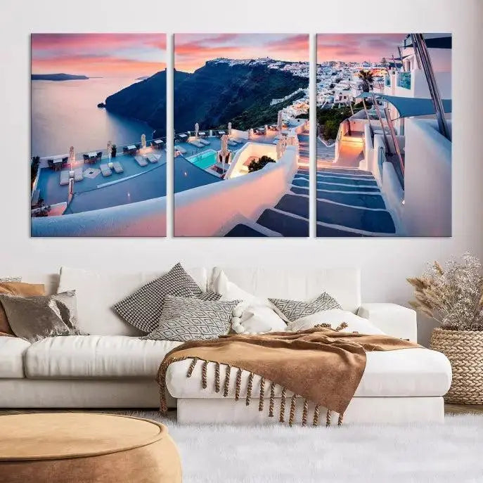 Greece Santorini Wall Art Landscape Canvas Print showcases a coastal village at sunset, featuring white buildings and an ocean view. The gallery-wrapped image is printed on museum-quality canvas for lasting beauty.