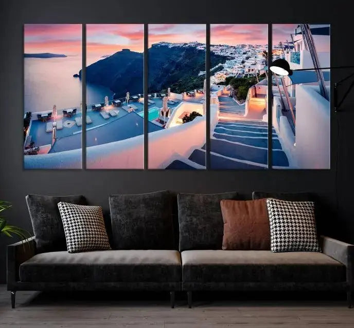 Greece Santorini Wall Art Landscape Canvas Print showcases a coastal village at sunset, featuring white buildings and an ocean view. The gallery-wrapped image is printed on museum-quality canvas for lasting beauty.