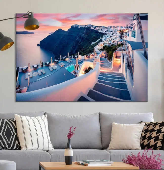 Greece Santorini Wall Art Landscape Canvas Print showcases a coastal village at sunset, featuring white buildings and an ocean view. The gallery-wrapped image is printed on museum-quality canvas for lasting beauty.