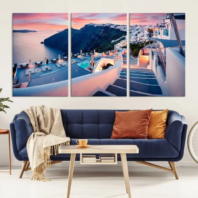 Greece Santorini Wall Art Landscape Canvas Print showcases a coastal village at sunset, featuring white buildings and an ocean view. The gallery-wrapped image is printed on museum-quality canvas for lasting beauty.