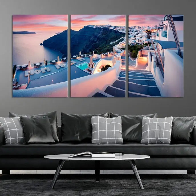 Greece Santorini Wall Art Landscape Canvas Print showcases a coastal village at sunset, featuring white buildings and an ocean view. The gallery-wrapped image is printed on museum-quality canvas for lasting beauty.