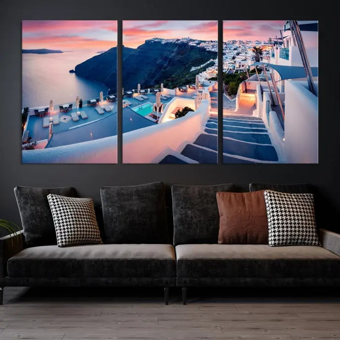 Greece Santorini Wall Art Landscape Canvas Print showcases a coastal village at sunset, featuring white buildings and an ocean view. The gallery-wrapped image is printed on museum-quality canvas for lasting beauty.