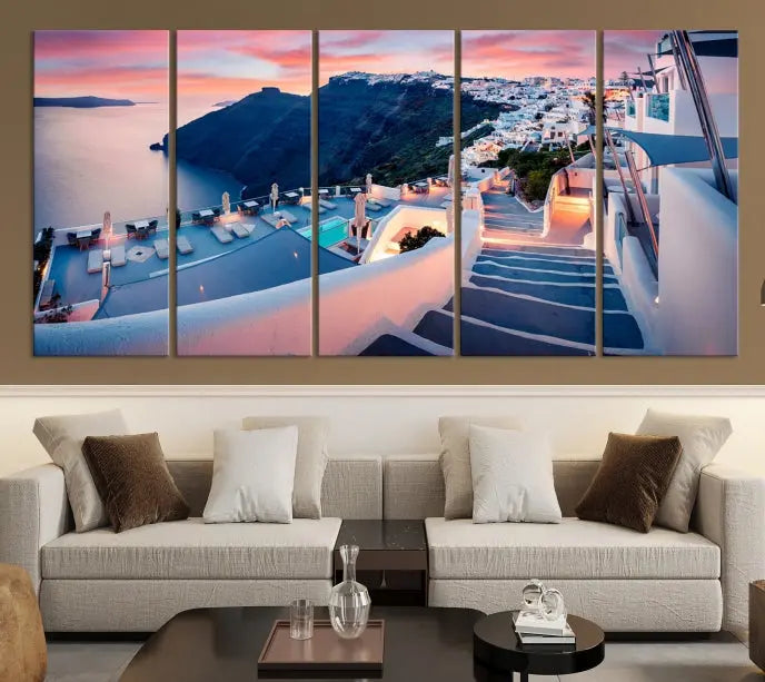 Greece Santorini Wall Art Landscape Canvas Print showcases a coastal village at sunset, featuring white buildings and an ocean view. The gallery-wrapped image is printed on museum-quality canvas for lasting beauty.