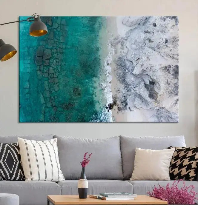 The Green Aerial Ocean Wall Art Canvas Print showcases a triptych of an aerial ocean view. Crafted on museum-quality canvas with gallery-wrapped edges and a UV-protective coating, it enhances both elegance and durability in your space.