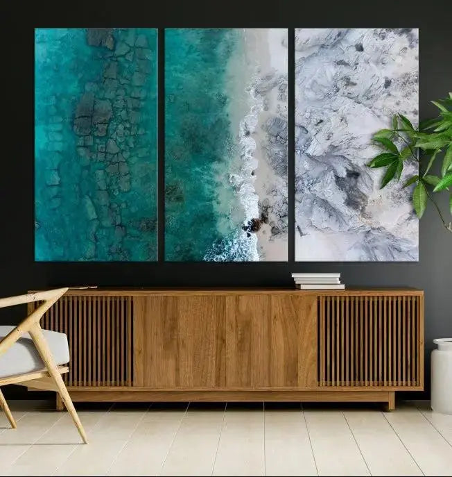 The Green Aerial Ocean Wall Art Canvas Print showcases a triptych of an aerial ocean view. Crafted on museum-quality canvas with gallery-wrapped edges and a UV-protective coating, it enhances both elegance and durability in your space.