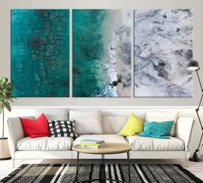 The Green Aerial Ocean Wall Art Canvas Print showcases a triptych of an aerial ocean view. Crafted on museum-quality canvas with gallery-wrapped edges and a UV-protective coating, it enhances both elegance and durability in your space.