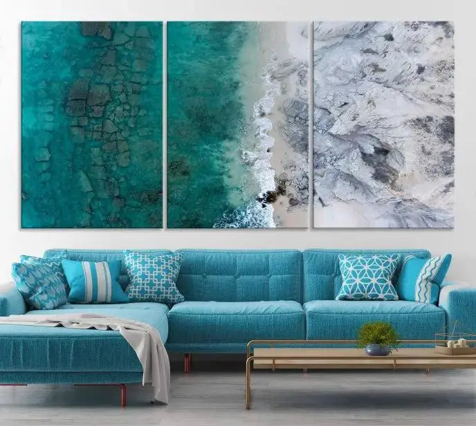 The Green Aerial Ocean Wall Art Canvas Print showcases a triptych of an aerial ocean view. Crafted on museum-quality canvas with gallery-wrapped edges and a UV-protective coating, it enhances both elegance and durability in your space.