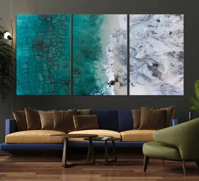 The Green Aerial Ocean Wall Art Canvas Print showcases a triptych of an aerial ocean view. Crafted on museum-quality canvas with gallery-wrapped edges and a UV-protective coating, it enhances both elegance and durability in your space.