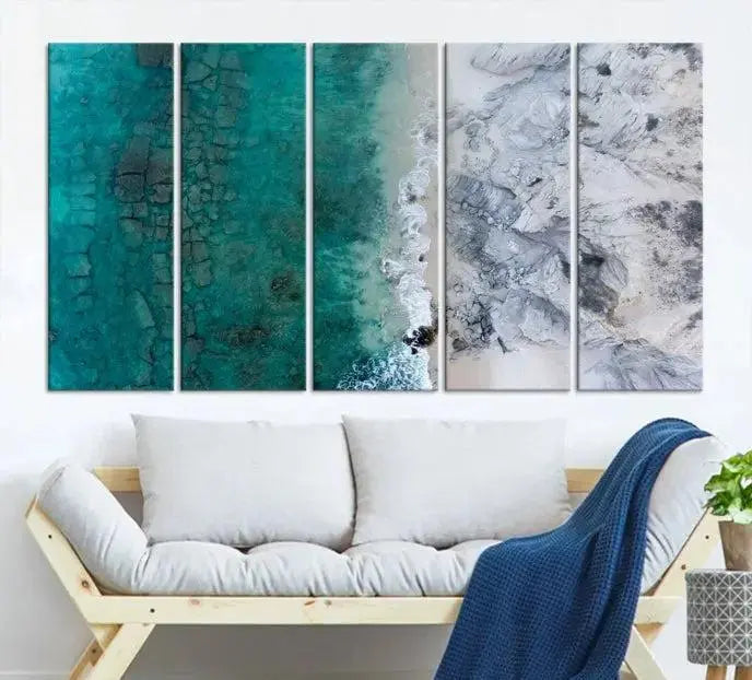 The Green Aerial Ocean Wall Art Canvas Print showcases a triptych of an aerial ocean view. Crafted on museum-quality canvas with gallery-wrapped edges and a UV-protective coating, it enhances both elegance and durability in your space.