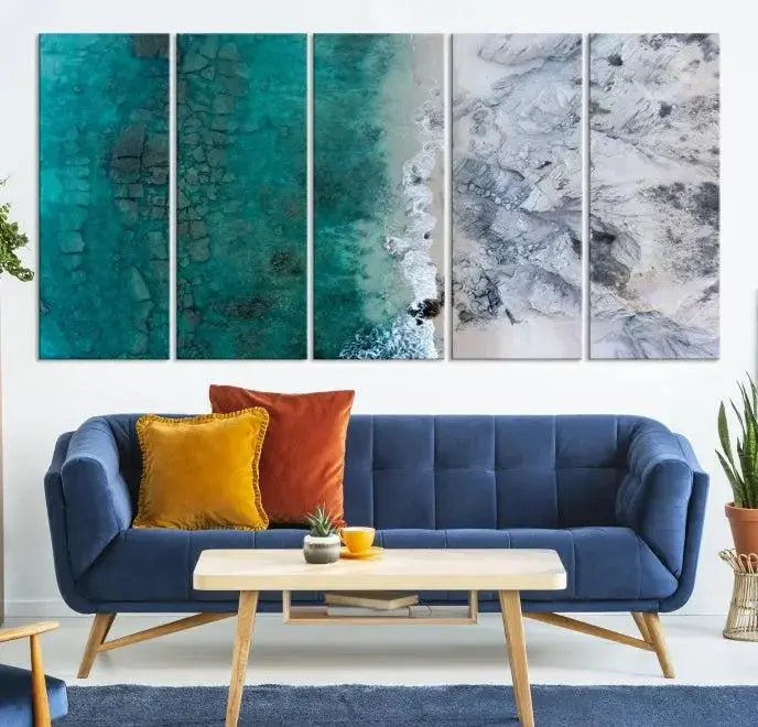 The Green Aerial Ocean Wall Art Canvas Print showcases a triptych of an aerial ocean view. Crafted on museum-quality canvas with gallery-wrapped edges and a UV-protective coating, it enhances both elegance and durability in your space.