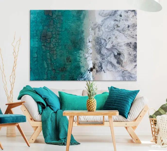 The Green Aerial Ocean Wall Art Canvas Print showcases a triptych of an aerial ocean view. Crafted on museum-quality canvas with gallery-wrapped edges and a UV-protective coating, it enhances both elegance and durability in your space.