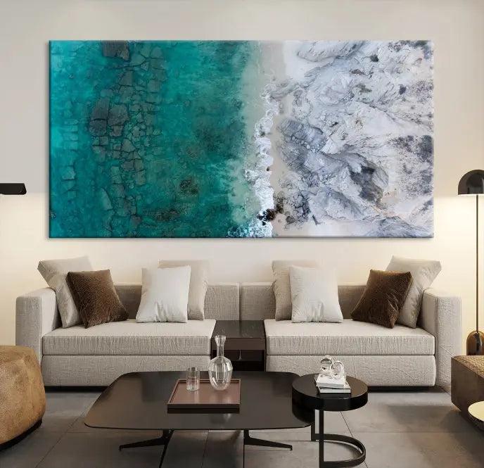 The Green Aerial Ocean Wall Art Canvas Print showcases a triptych of an aerial ocean view. Crafted on museum-quality canvas with gallery-wrapped edges and a UV-protective coating, it enhances both elegance and durability in your space.